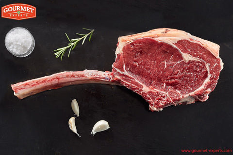 Tomahawk steak, premium beef, grilled perfection, bold flavor, carnivore's delight, impressive presentation, succulent taste, tender, gourmet grilling, barbecue masterpiece, BBQ