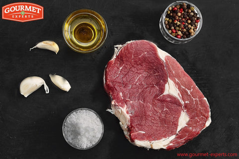 Dry aged ribeye steak, premium steak, exceptional flavor, perfectly aged, tenderness, marbling, gourmet dining, steakhouse quality, culinary delight